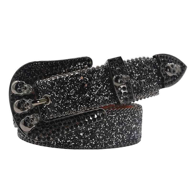 The “Afterworld Bling” Y2K Skull & Rhinestone Studded Belt Bling Y2K skull rhinestone belt with black studs and skull details. Perfect for edgy, trendy fashion.