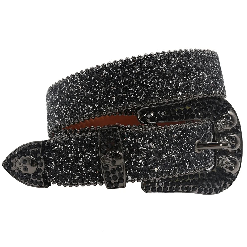 The “Afterworld Bling” Y2K Skull & Rhinestone Studded Belt Blingy black rhinestone belt with skull and Y2K-inspired design, perfect for edgy fashion statements.
