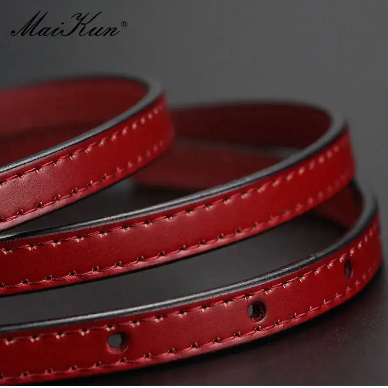 Elegant Leather Belt with Alloy Buckle Red genuine leather women's belt with alloy pin buckle, stylish and adjustable.