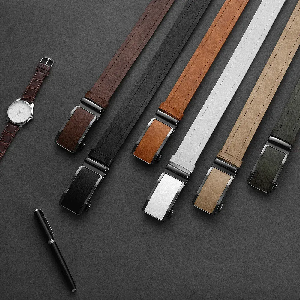 Leather belt collection with various colors and buckle styles. Elegant leather belts for men, featuring adjustable ratchet mechanisms for a perfect fit.