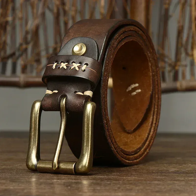 Handcrafted Cowhide Belt with Brass Buckle Cowhide leather belt with solid brass buckle for a stylish look.