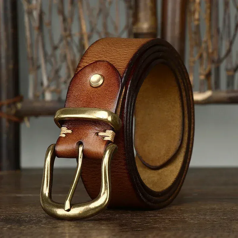 Leather Belt with Brass Buckle for Men and Women Leather belt with solid brass buckle, stylish and durable for everyday wear.
