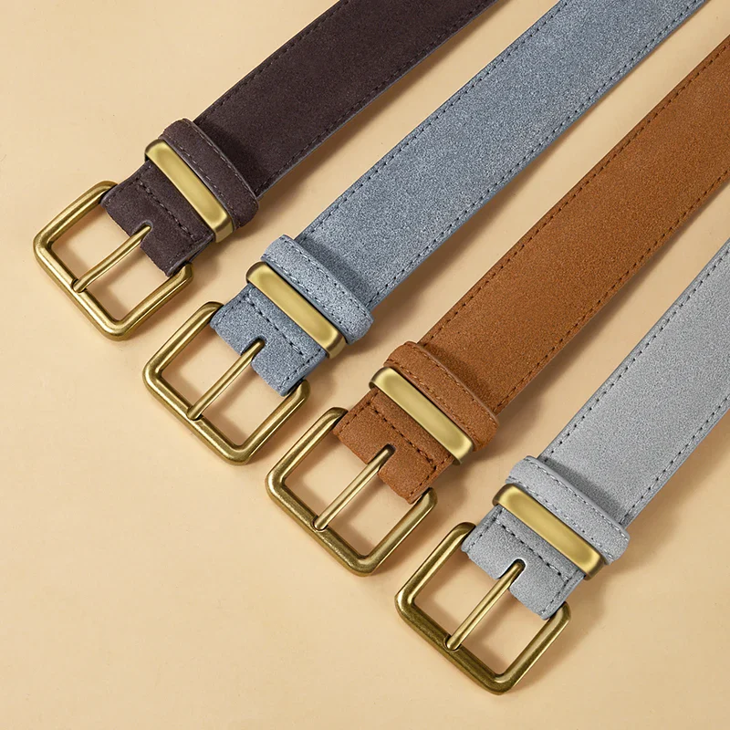 Leather belt collection with gold buckle detail Elegant suede cowhide belts with gold buckles in various colors.