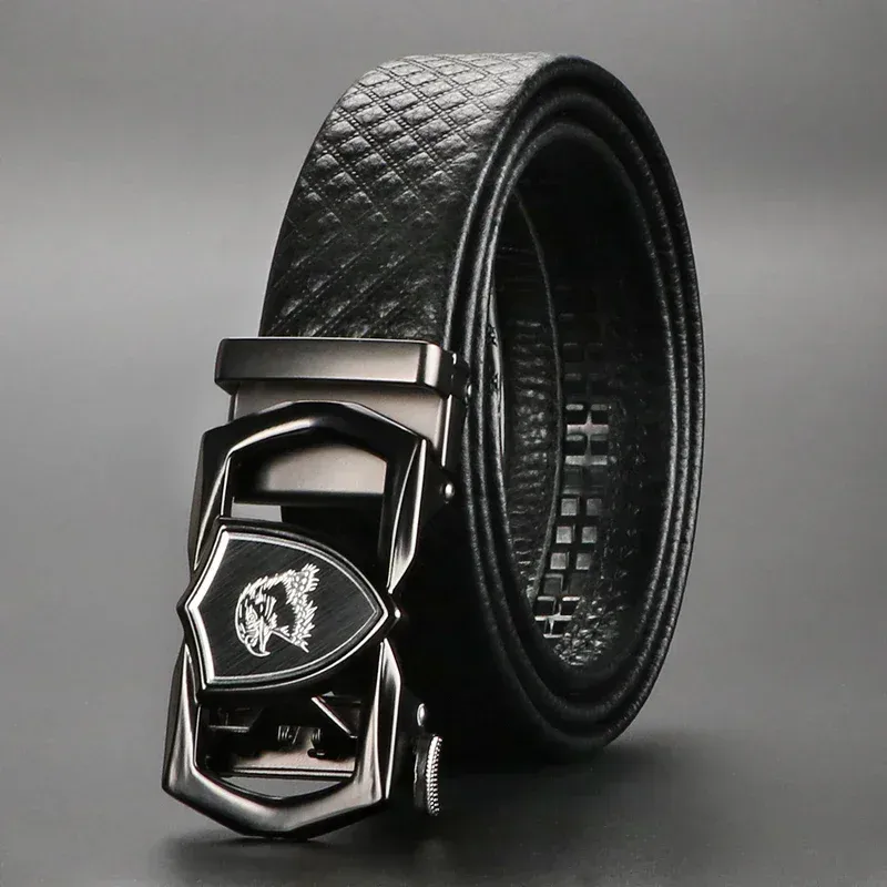 Elegant black ratchet belt with a sleek metal buckle and textured leather strap. High-quality CoreLine Decade ratchet belt featuring top-layer cowhide leather and a modern buckle de.