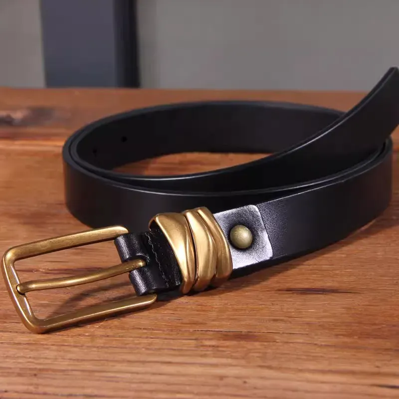 Luxury Heritage Slim Belt Elegant black leather slim belt with gold-tone buckle. Perfect for sophisticated outfits and everyda.