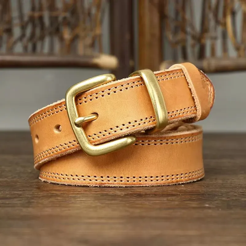 Women’s Natural Cowskin Belt with Solid Copper Buckle Cowskin leather belt with solid copper buckle, natural finish, stylish and durable accessory.