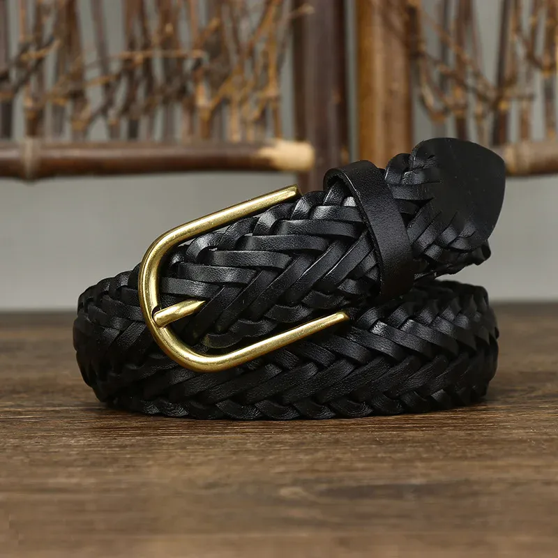 Black full grain weaving belt with brass buckle, artisanal craftsmanship, perfect for casual or formal wear. Black full grain weaving belt with brass buckle, artisanal craftsmanship, perfect for casual or form.