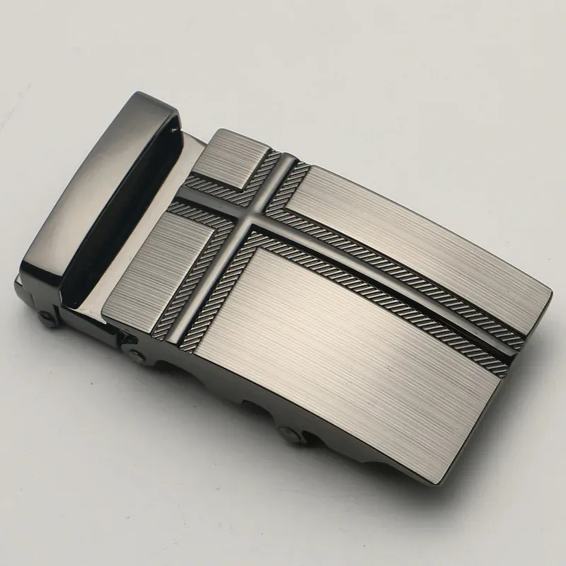Shiny multi-style automatic watch buckle Close-up of a sleek, multi-style automatic watch buckle in silver and black.