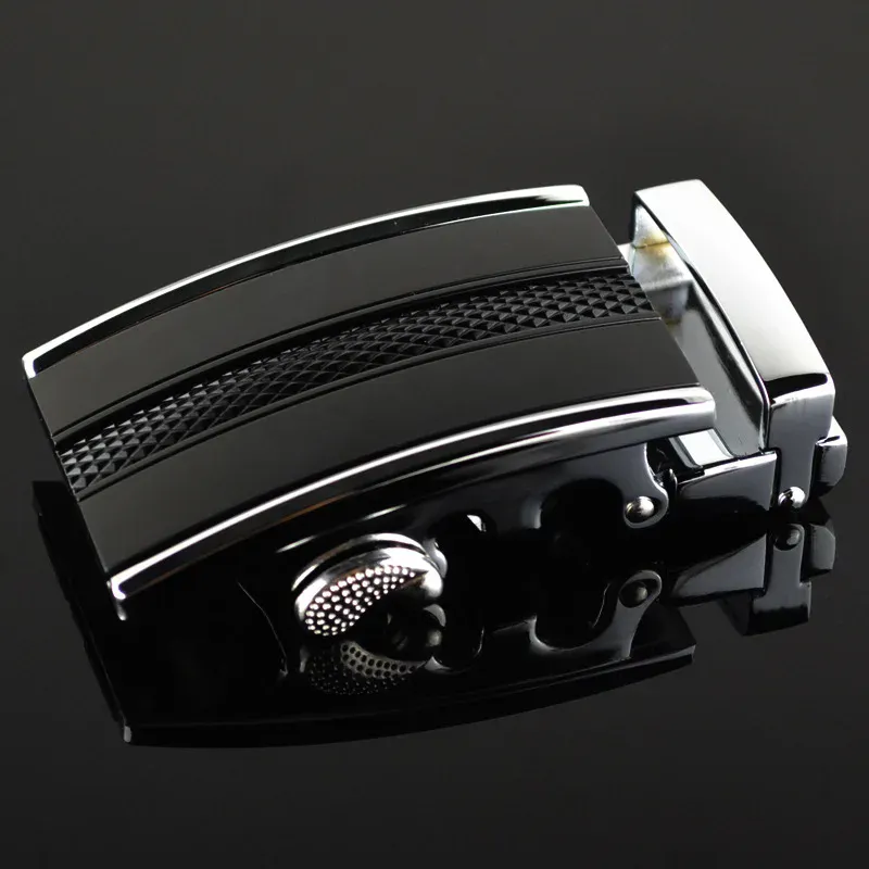 Luxury automatic buckle in black with textured detail and polished finish. Automatic designer buckle for high-end fashion accessories.