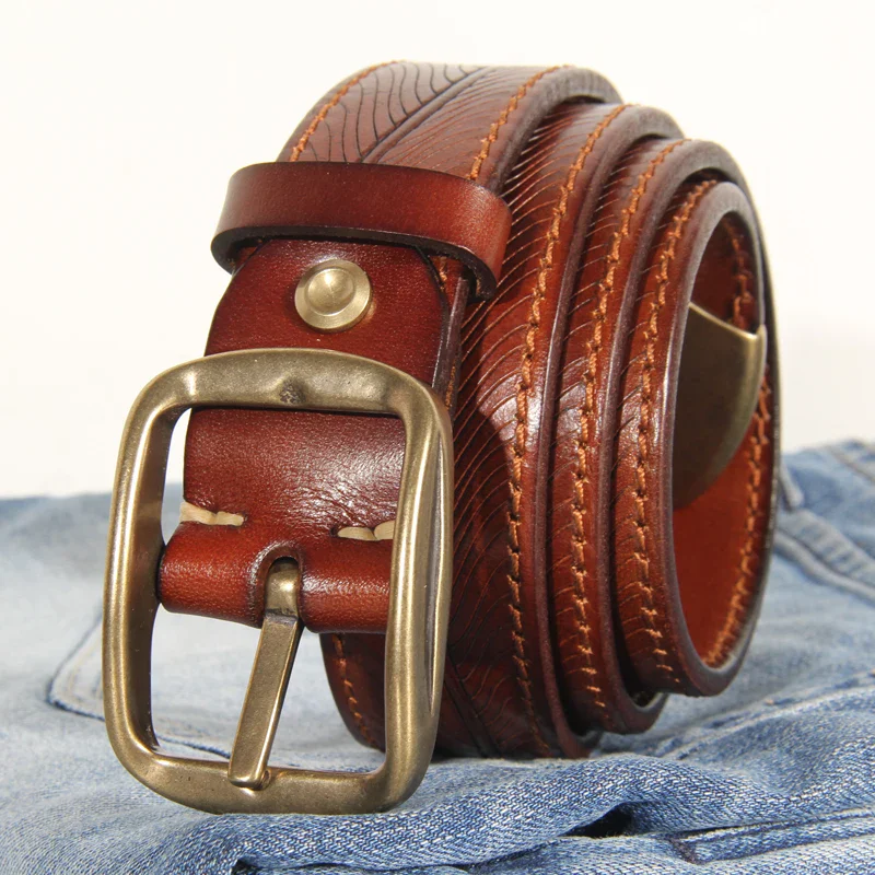 Leather Belt with Double-Sided Heritage Embossing Elegant double-sided embossed leather belt for versatile style. Crafted with premium 5mm thick leath.