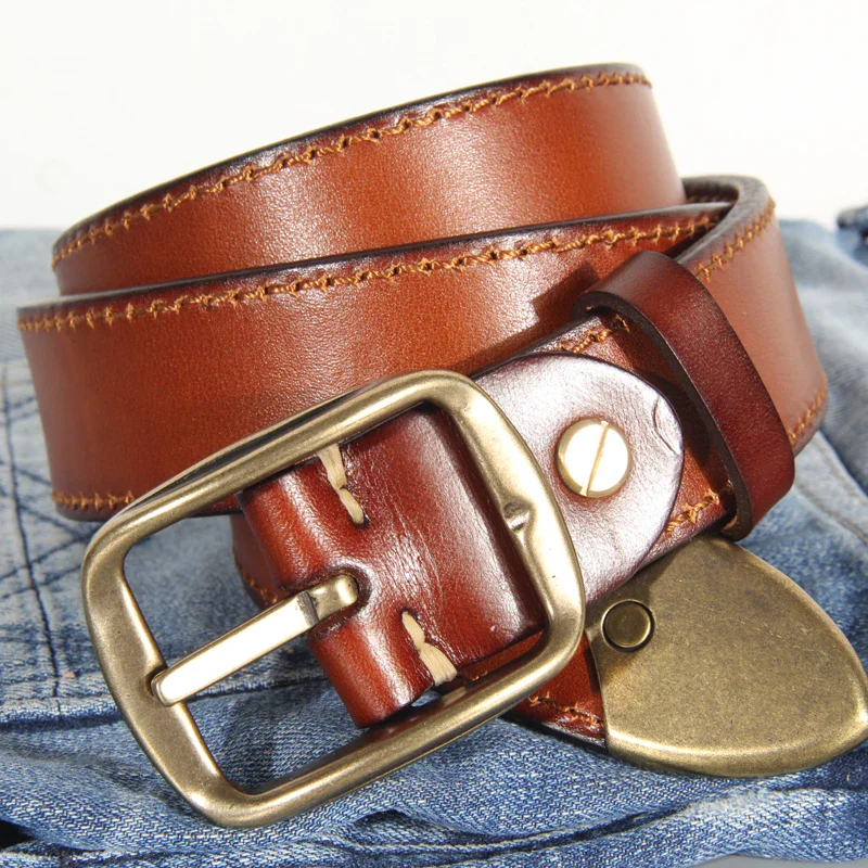Leather Belt with Double-Sided Heritage Embossing Embossed leather belt featuring double-sided heritage design, 5mm thickness, and a sturdy brass buck.