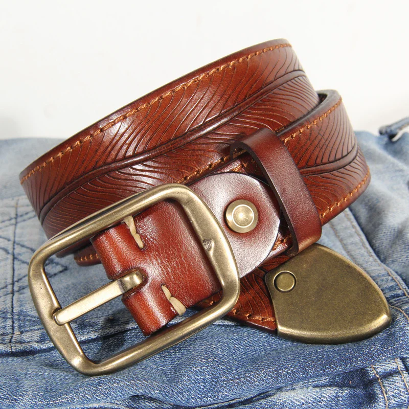 Leather Belt with Double-Sided Heritage Embossing Stylish double-sided embossed leather belt for versatile fashion. Perfect for casual and formal wear.