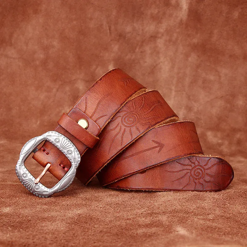Vintage Leather Belt with Sun and Arrow Designs Leather belt with engraved sun and arrow patterns, full grain vintage washed finish.