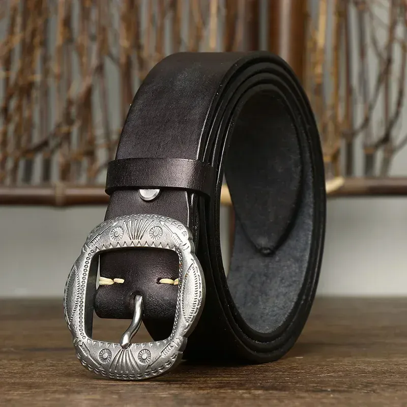 Vintage Washed Heritage Leather Belt with Ornate Silver Buckle Vintage washed leather belt featuring an intricate silver buckle for a classic, timeless look.