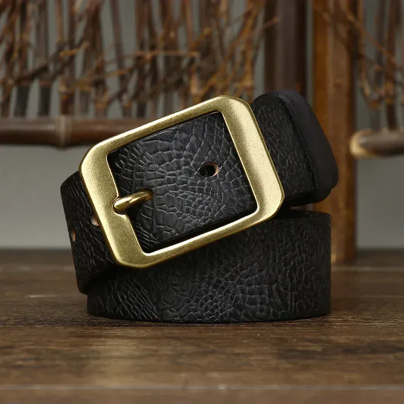 Heritage 38 Caiman Crocodile Belt Caiman crocodile-embossed leather belt with solid brass buckle.