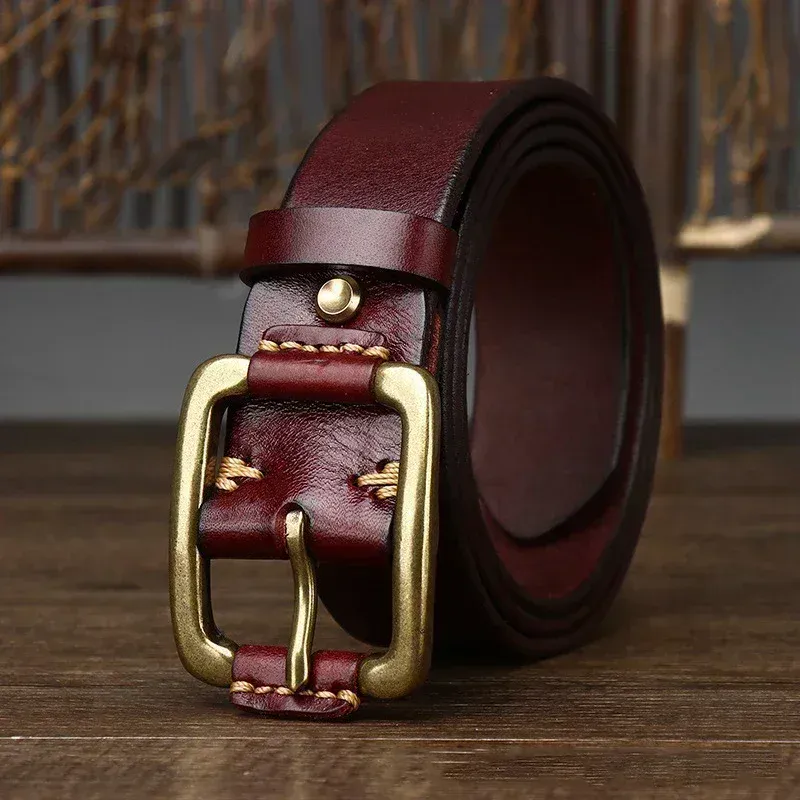 Heritage 38 Leather Belt with Brass Buckle Heritage 38 full-grain leather belt featuring a solid brass buckle, perfect for classic and stylish.