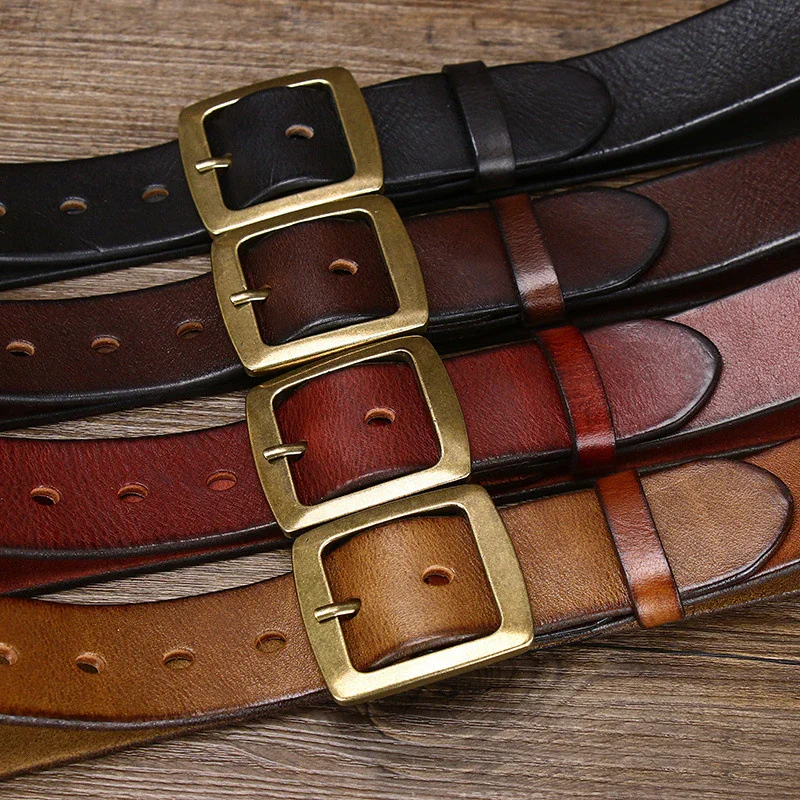 Elegant full-grain leather belts with brass buckles in black, brown, red, and tan. Perfect for stylish, durable everyday wear. High-quality full-grain leather belts featuring solid brass buckles, available in black, brown, red,.