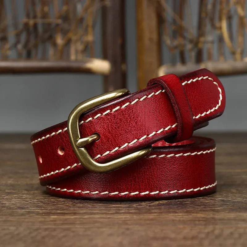 Leather pet collar with brass buckle, red color, and white stitching. Red leather pet collar with brass buckle and white stitching for small dogs.