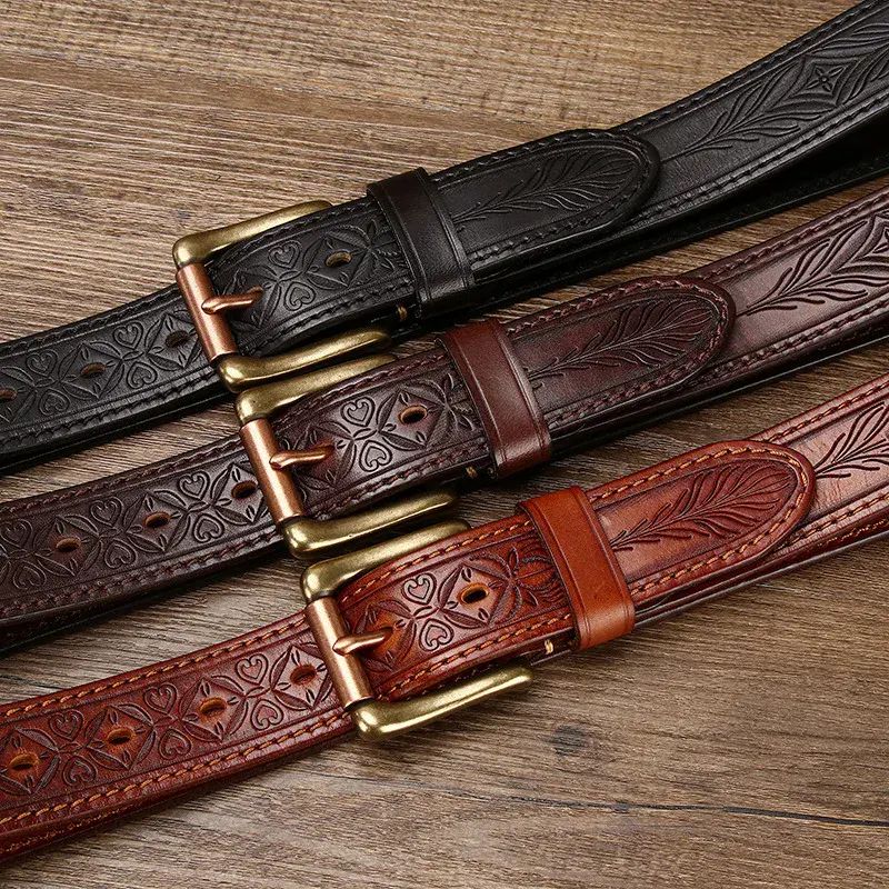 Western Forge Embossed Leather Belts with Brass Buckle Embossed full-grain leather belts featuring solid brass buckles, available in black, brown, and tan.