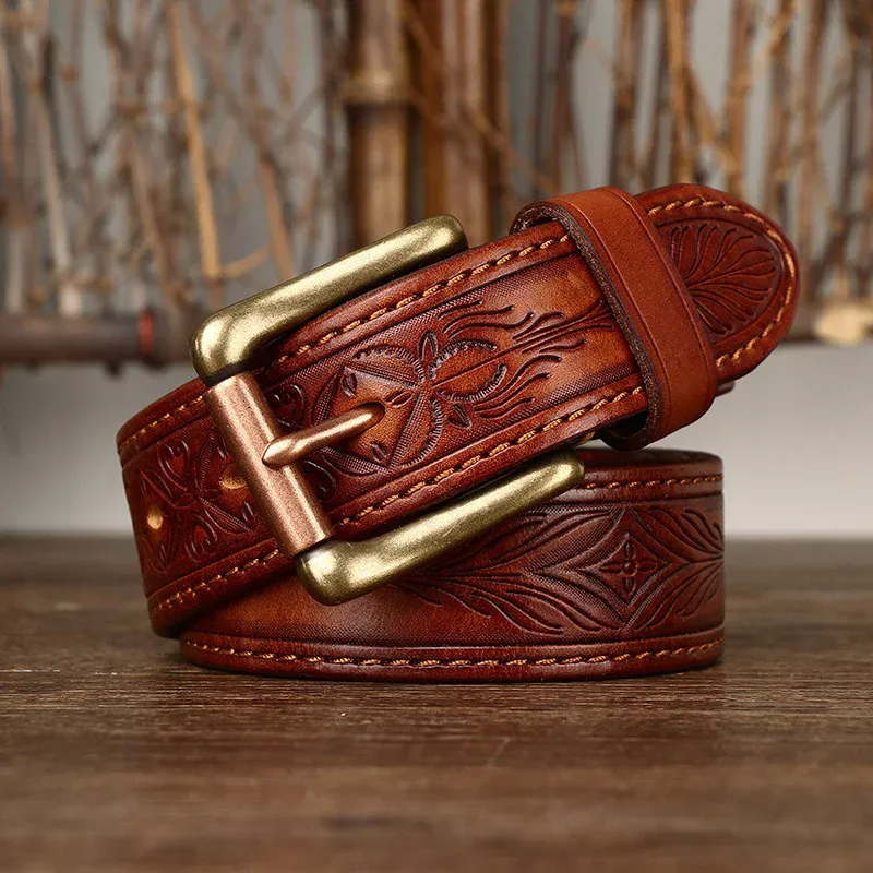 Western Forge Embossed Leather Belt with Brass Buckle Embossed full-grain leather belt featuring a solid brass buckle for durability and style. Perfect fo.