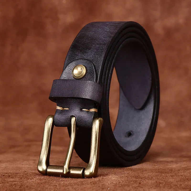 Full-Grain Cowhide Belt with Brass Buckle Premium full-grain cowhide belt featuring a solid brass buckle for durability and classic style. Per.