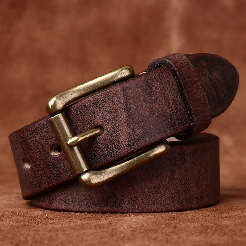 Leather belt with brass buckle for men and women, full-grain cowhide material. High-quality full-grain cowhide leather belt with solid brass buckle for durability.