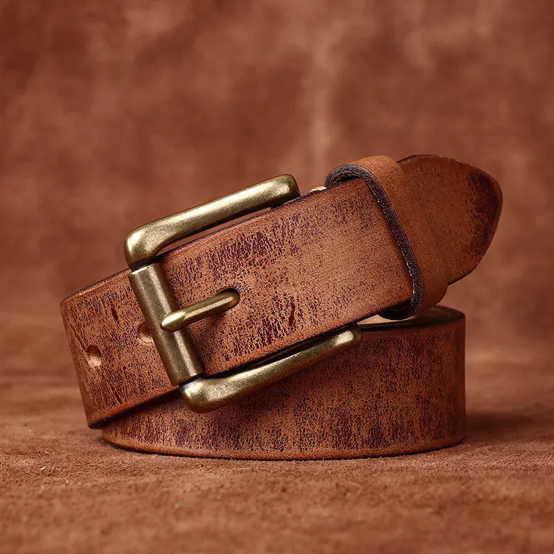 Leather belt with brass buckle for men and women, full-grain cowhide, stylish and durable accessory. High-quality full-grain cowhide belt with solid brass buckle, perfect for everyday wear.