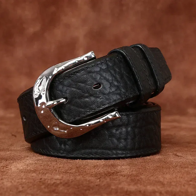 Leather Horseshoe Belt with Metal Buckle Black leather horseshoe belt with hammered metal buckle for men.