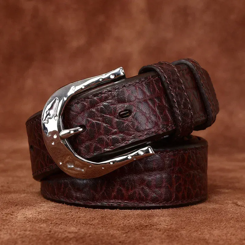 Vintage leather belt with hammered metal buckle for men Leather belt with hammered metal buckle, stylish accessory for casual or formal wear.