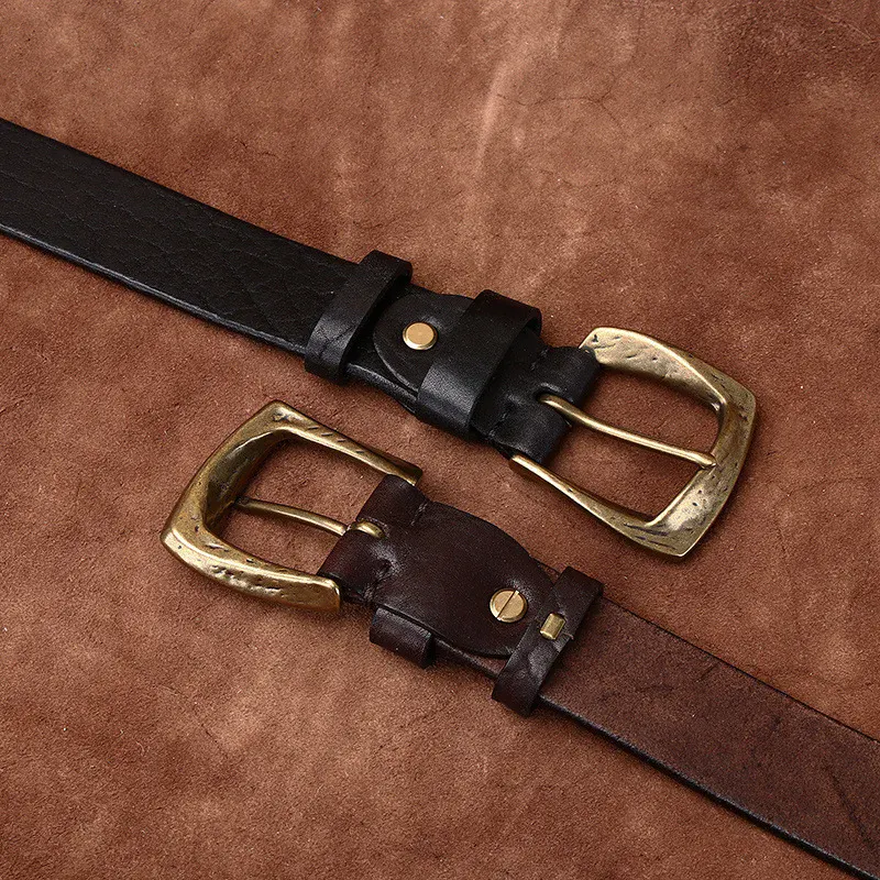 Heritage Copper & Cowhide Work Belt Elegant leather work belt with copper accents and sturdy cowhide strap.