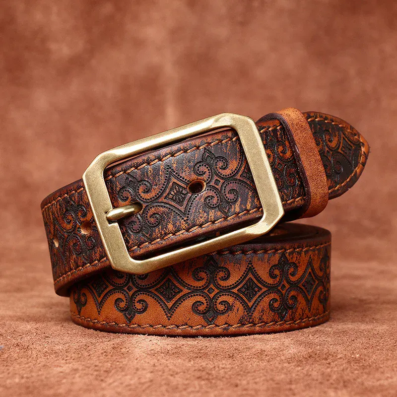 Heritage-Floral Embossed Italian Cowhide Belt Elegant floral embossed Italian cowhide belt with vintage brass buckle.