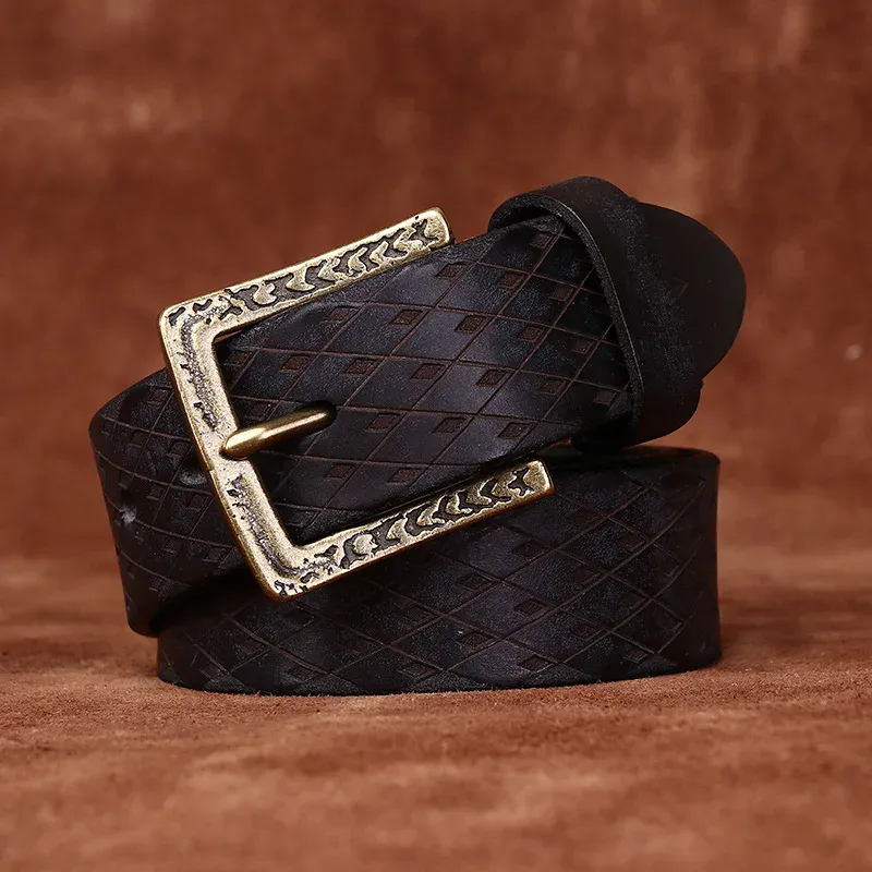 Canyon-Carved Italian Cowhide Belt Elegant Italian cowhide belt with carved details and a vintage-style buckle.