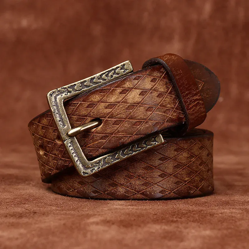 Leather Cowhide Belt with Ornate Buckle Elegant Italian cowhide leather belt with a carved buckle, perfect for stylish outfits.