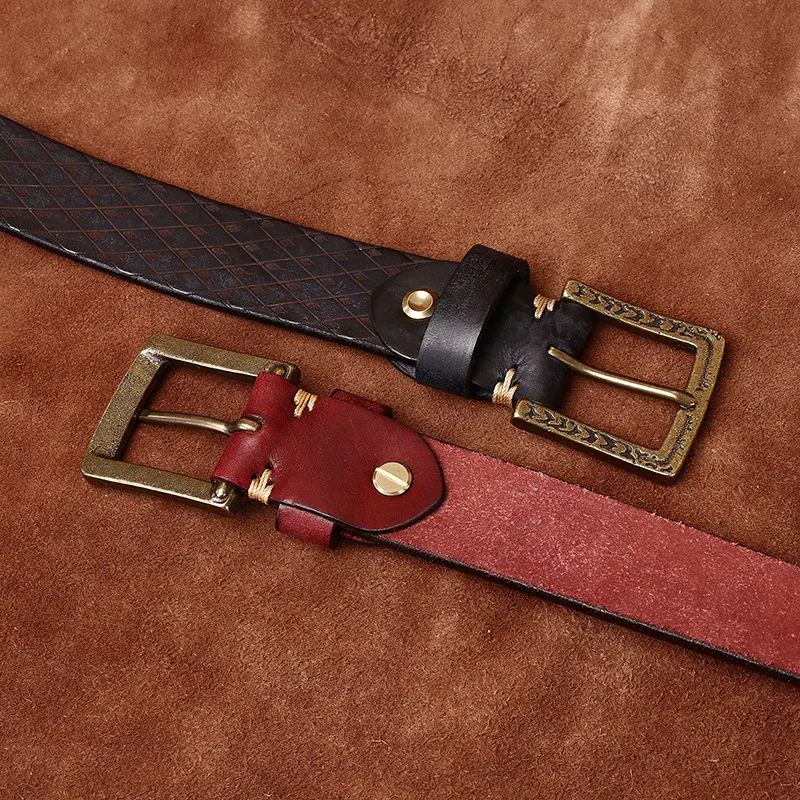 Hand-Carved Italian Cowhide Belts with Brass Buckles Elegant Italian cowhide belts featuring hand-carved details and vintage brass buckles for a stylish.