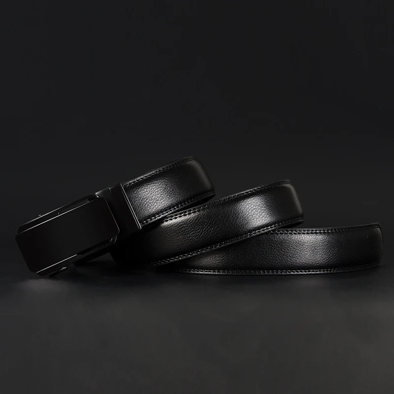 Black Leather Ratchet Belt for Men Minimalist black ratchet leather belt on a dark background.
