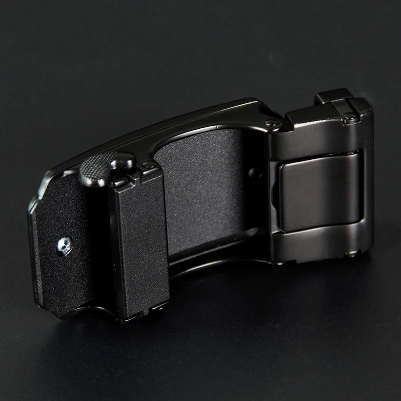 Black Ratchet Leather Belt Ratchet leather belt with minimalist black design and sleek buckle.