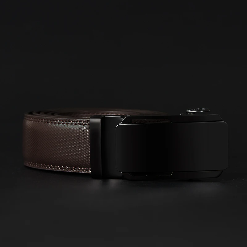 Shadow-Plate Minimalist Black Ratchet Leather Belt Black ratchet leather belt with sleek minimalist design and textured finish.
