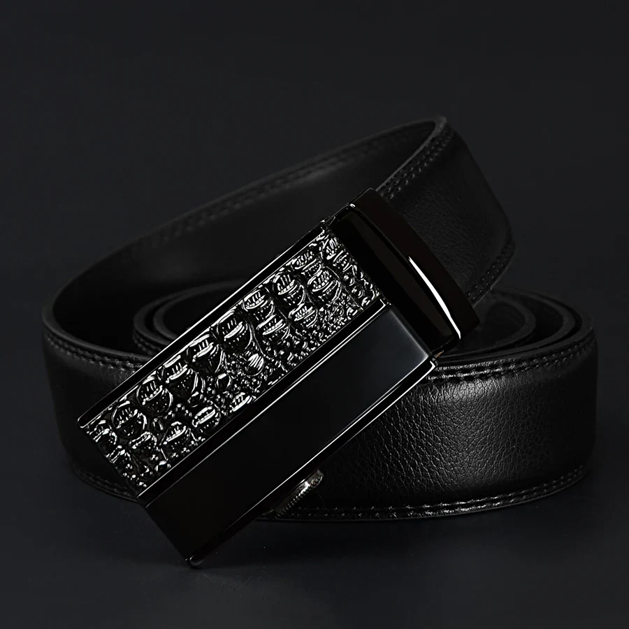 Black leather belt with a decorative metal buckle for men Elegant black leather belt with a stylish, detailed metal buckle for a sophisticated look.