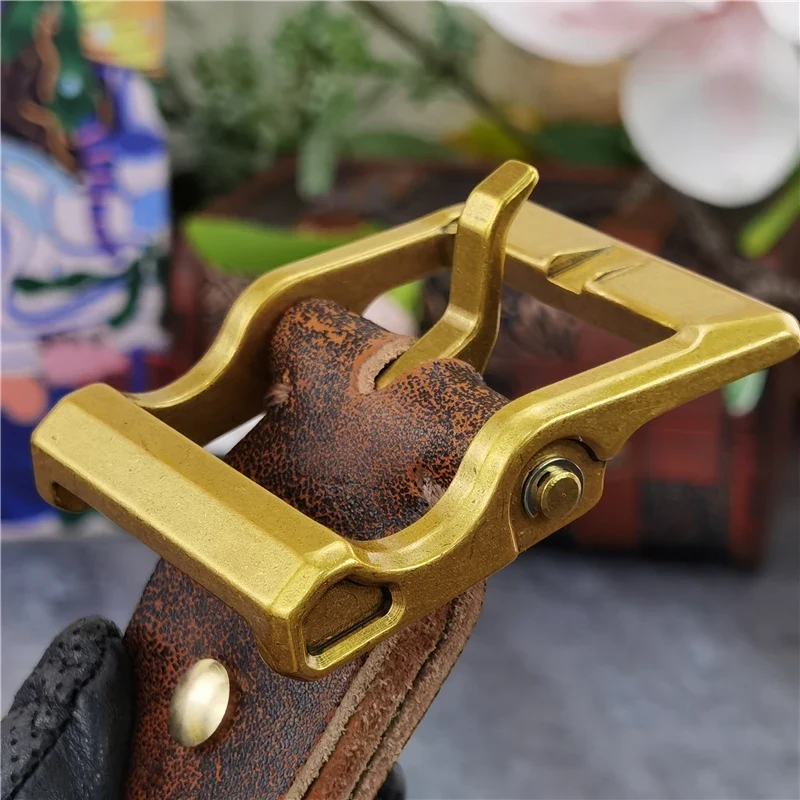 Forge Solid Brass Heritage Belt Buckle Close-up of a brass belt buckle on a leather belt, showcasing craftsmanship.
