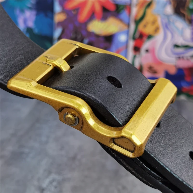 The Forge Solid Brass Heritage Belt Solid brass buckle on a black leather belt for a vintage look.