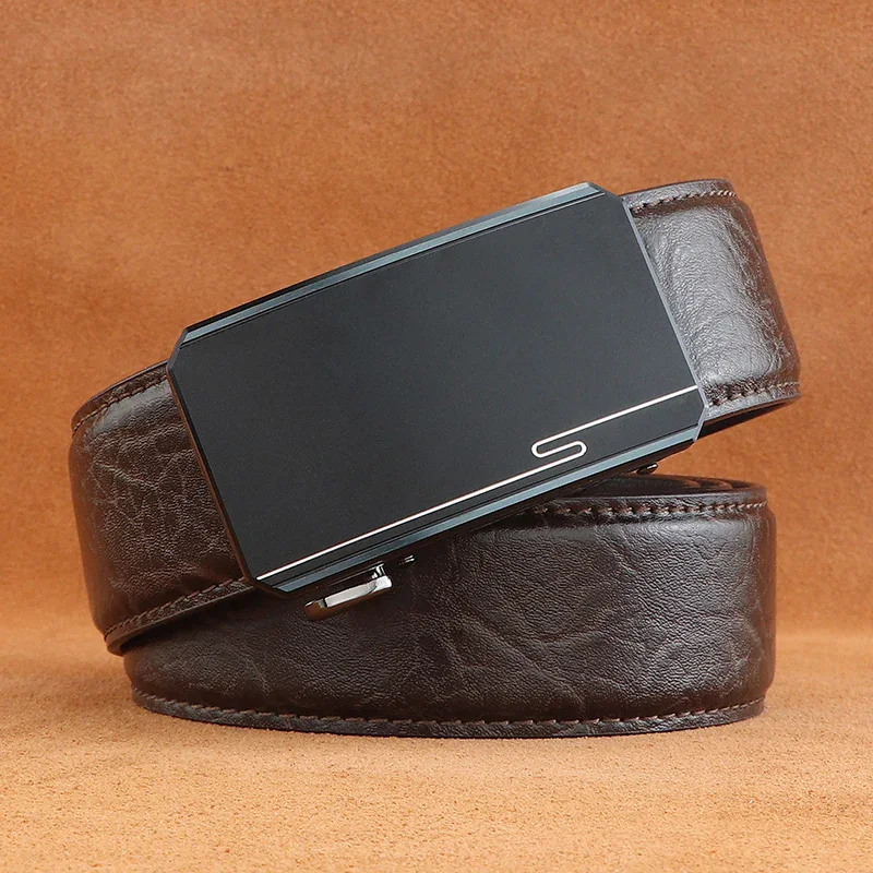 Leather Ratchet Belt with Hidden-Tail Buckle Leather ratchet belt with hidden-tail buckle for a sleek, adjustable fit. Perfect for stylish, funct.