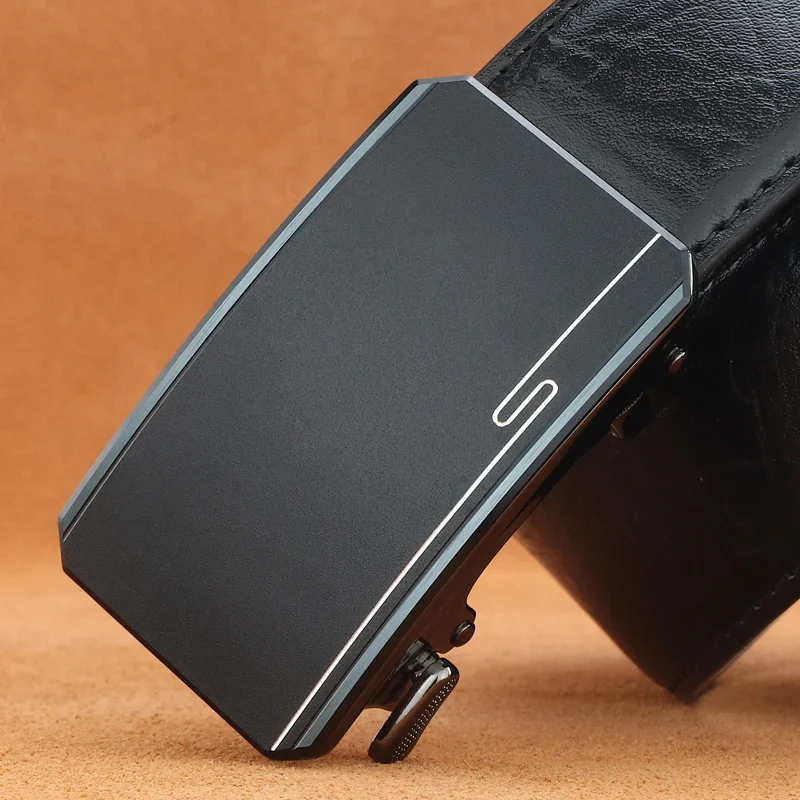 Ghost Hidden-Tail Automatic Ratchet Belt Automatic ratchet belt with sleek black buckle design.