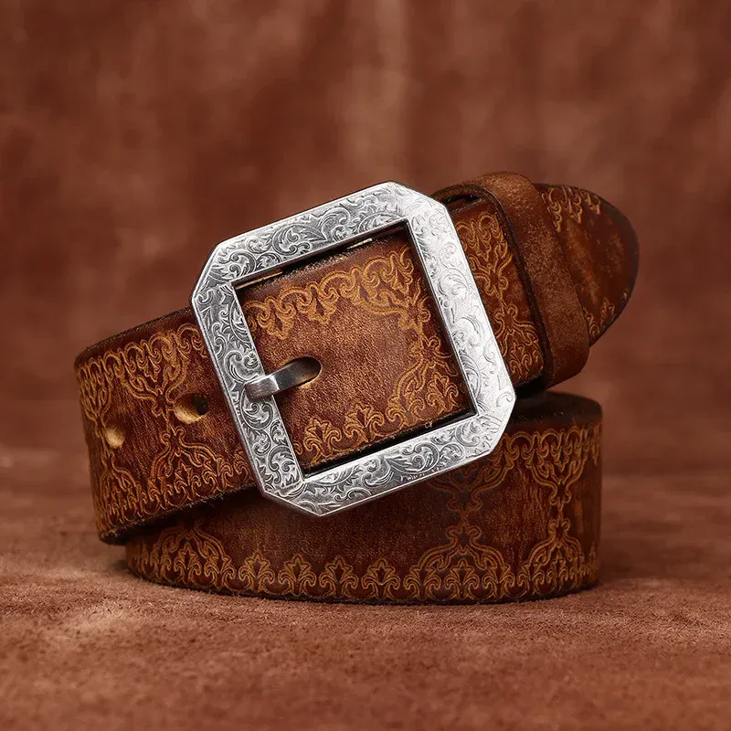 Men’s Leather Belt with Steel Buckle Leather belt with ornate silver buckle for men.