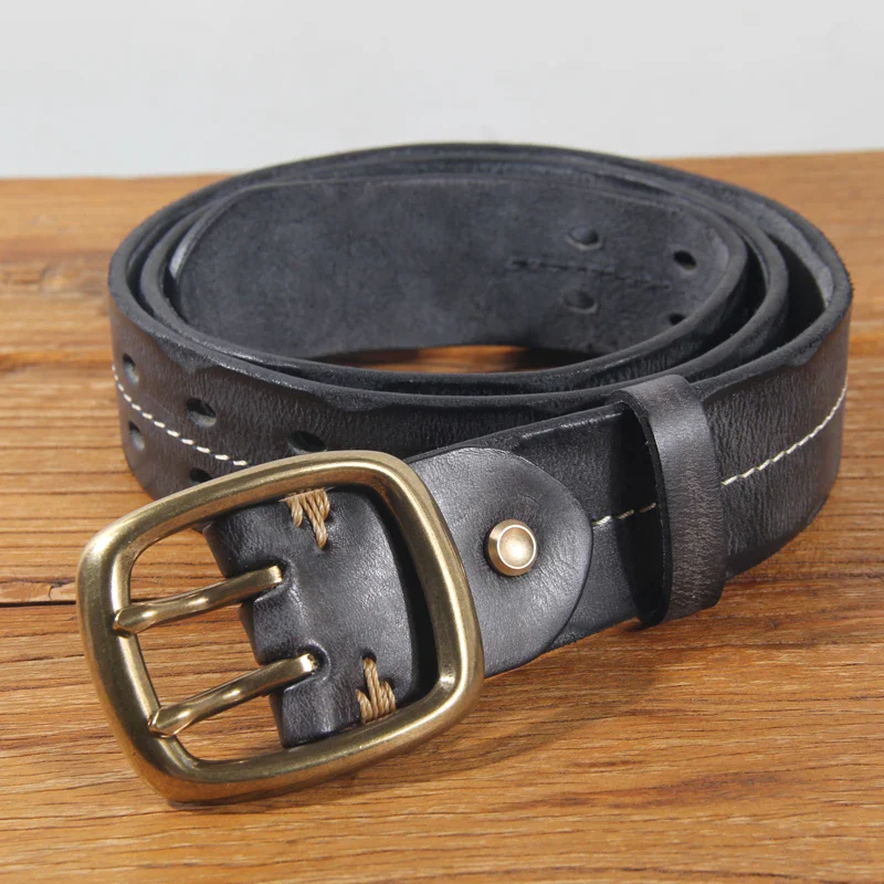 Vintage Men’s Leather Double Prong Belt Leather men's belt with double prong buckle, heavy-duty design. Perfect for jeans and casual wear.