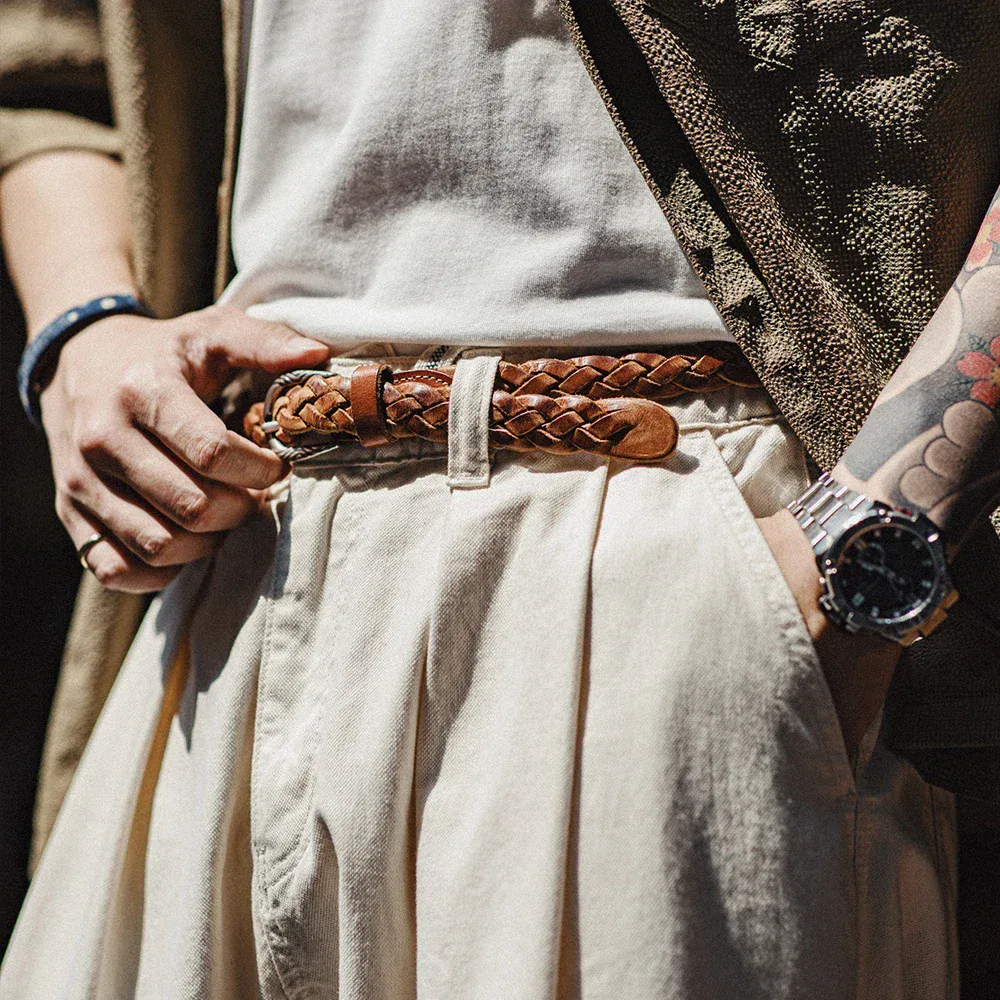 Men's braided leather belt for casual and formal wear.