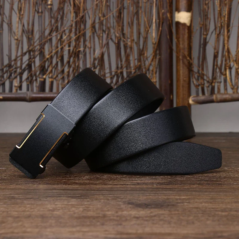Leather belt with gold buckle on wooden surface, rustic background Elegant black leather belt with gold buckle, perfect for formal or casual wear.