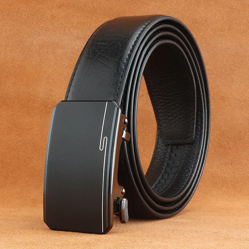 Black engineered leather belt with hidden ratchet buckle for men and women.